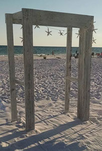 Image of a 4 post distressed wood arbor - Marry Me In Destin