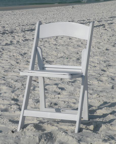 Image of white resin folding chair with white vinyl padded seat - Marry Me In Destin