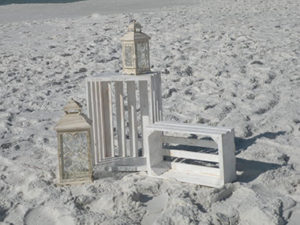 Image of large and small white crates with large and small lanterns - Marry Me In Destin